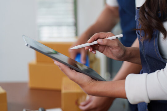 Digital Transformation. Professional woman using tablet for inventory management.