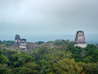 Temples I, II and III at dawn, elevated view, Tikal, Peten Department, Guatemala