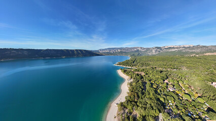 Mountain lake Lac de Sainte-Croix and forest landscape, Alpes-de-Haute-Provence, France, Europe.