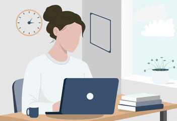 Freelancer working on a laptop in a cozy home office