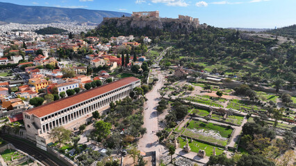 Obraz premium Aerial drone photo of iconic Ancient Agora of Athens built below Acropolis hill featuring Temple of Hephaestus and stoa of Atalos among many other antiquities, Attica, Greece