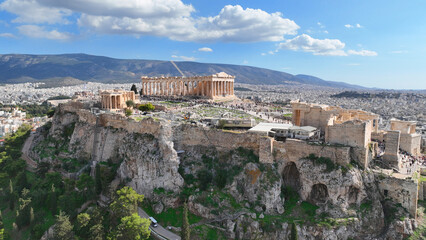 Fototapeta premium Aerial drone photo of iconic Acropolis hill and the Parthenon featuring Erechtheion and Porch of the Caryatids, Athens historic centre, Attica, Greece