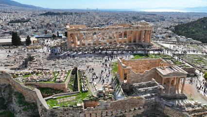 Aerial drone photo of iconic Acropolis hill and the Parthenon featuring Erechtheion and Porch of...