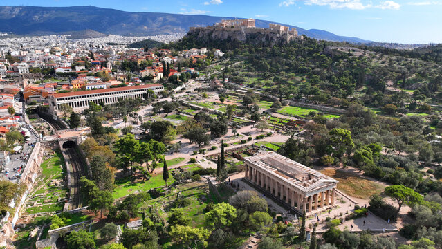 Aerial drone photo of iconic Ancient Agora of Athens built below Acropolis hill featuring Temple of Hephaestus and stoa of Atalos among many other antiquities, Attica, Greece
