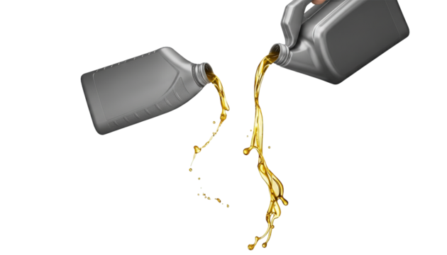 Motor oil is poured from two containers, creating a dynamic stream against transparency.
