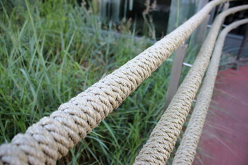Close-up of thick rope railing