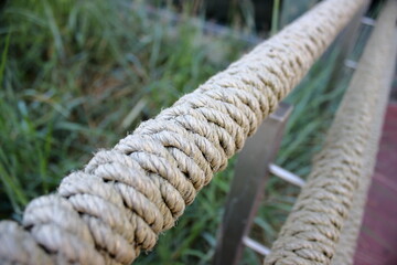 Close-up of thick rope railing