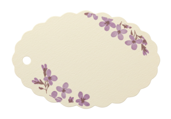 Isolated ornate beige tag with scalloped edges and purple floral design embellishments