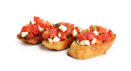 Tasty bruschettas with tomatoes and mozzarella cheese isolated on white