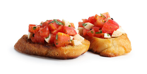 Tasty bruschettas with tomatoes and mozzarella cheese isolated on white