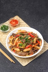 Gungjung tteokbokki (royal rice cake) or ganjang tteokbokki (rice cake with soy sauce), tastes more like another famous Korean food, japchae.
