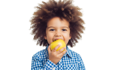 Happy african american boy eating a yellow apple isolated on transparent background healthy snack for child