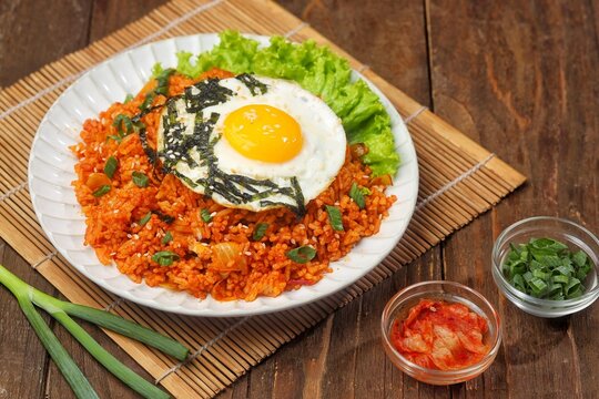 Kimchi bokkeumbap (kimchi fried rice) is a Korean dish consisting of rice fried with kimchi.