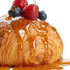 Golden Croissant Drizzled with Honey and Topped with Fresh Berries Powdered Sugar Isolated on White Background with Soft Studio Lighting