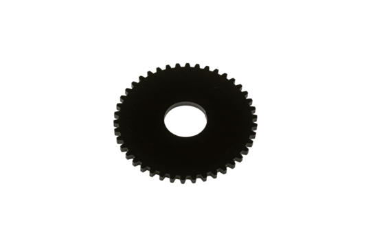 Black gear wheel made of hard plastic material is isolated.