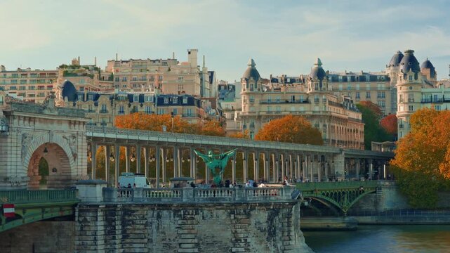Paris, France - 26.08.2025 : The parisian urban subway passes over a bridge. The oldest green metro line, number 6 in Paris. Timelapse