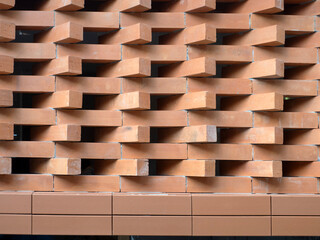 Red bricks for building in construction site for background.