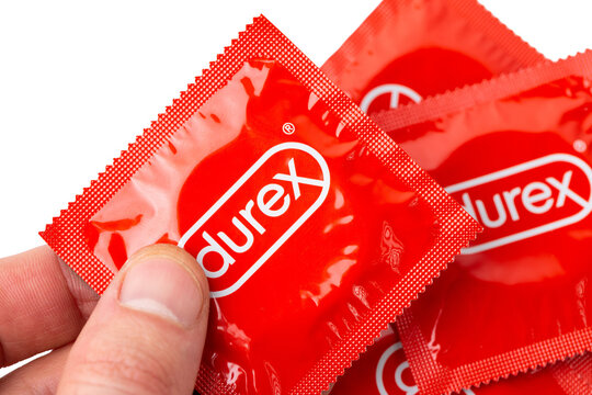 A picture of a red condom package of the brand Durex.
