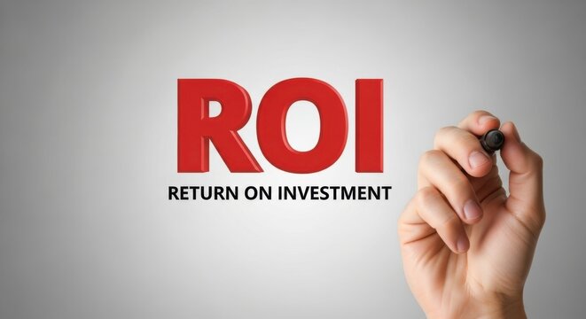 Hand writing return on investment roi on a grey background for business success