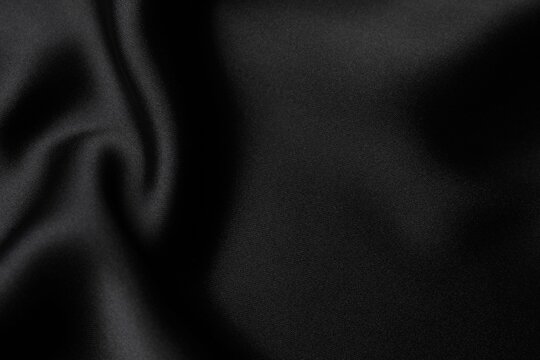 Black fabric cloth texture for background and design art work, beautiful crumpled pattern of silk or linen - Powered by Adobe