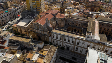 Fototapeta premium Aerial view of the College Church located in the historic center of Sciacca, in the province of Agrigento, Sicily, Italy. It is located next to the city hall.