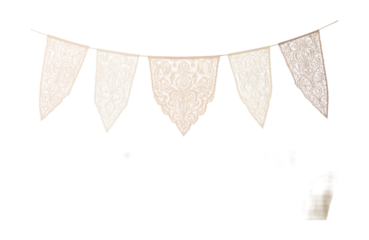 Intricate lace flags for a chic bridal shower in a home dining space.