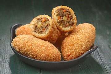 Curry Bun or Kare Pan, Japanese curry bun filled with vegetables and minced meat cooked with curry spices