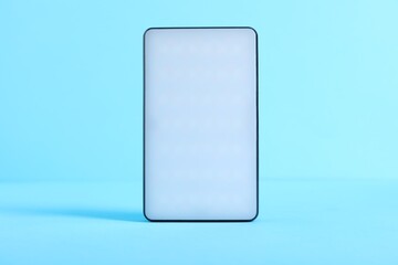 Stylish LED lamp on light blue background