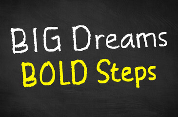 words of inspiration Big dreams Bold steps. Inspirational and motivational quotes on blackboard