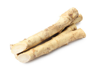Three fresh horseradish roots isolated on white