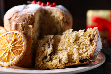 Christmas food. Delicious Panettone cake on table, closeup