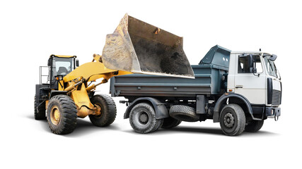 A yellow loader lifts dirt from a gray dump truck, showcasing teamwork between heavy machinery in a construction setting with a clean background.