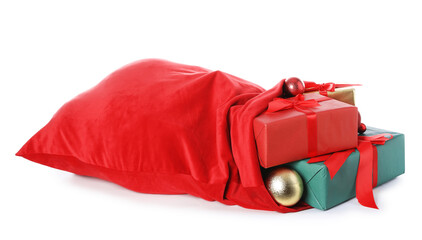 Naklejka premium Red Santa Claus bag with Christmas gifts and baubles isolated on white
