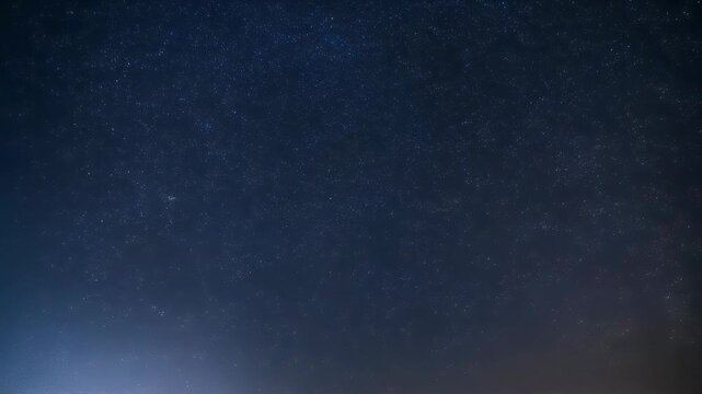 A breathtaking expanse of a dark night sky adorned with countless twinkling stars, stretching across the celestial sphere.