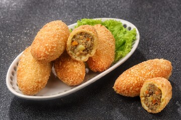 Curry Bun or Kare Pan, Japanese curry bun filled with vegetables and minced meat cooked with curry spices