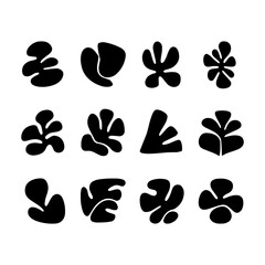 Creative black silhouettes of abstract floral and organic shapes on a white background for artistic design purposes