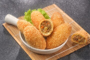 Curry Bun or Kare Pan, Japanese curry bun filled with vegetables and minced meat cooked with curry spices