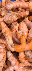 Turmeric is a herbaceous plant in the ginger family with an underground rhizome.
