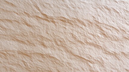 Textured background of crumpled beige paper showcasing natural imperfections and softness, ideal for creative projects and artistic applications.