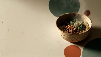 Steaming bowl of delicious healthy grain salad with fresh vegetables and herbs on colorful background