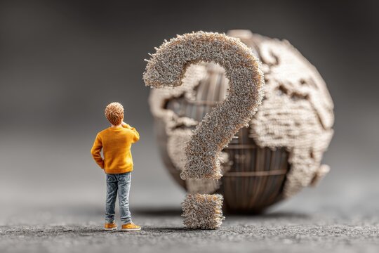 Person holds digital globe with a large question mark floating above their hands expressing need for answers - Powered by Adobe