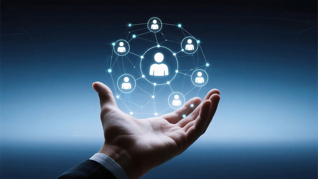 Hand holding network of connected people icons