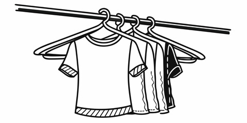 Shirts hanging on a clothes rail with multiple hangers displaying a variety of t shirts and garments