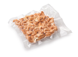 Vacuum plastic bag of roasted cashew nuts © Coprid