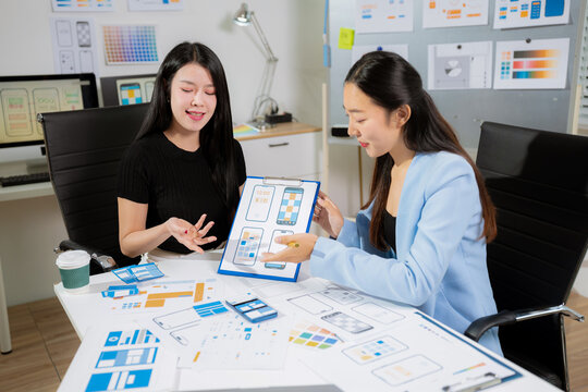 designer team coder or developer working using a computer display and smartphone in problem solving at workplace.