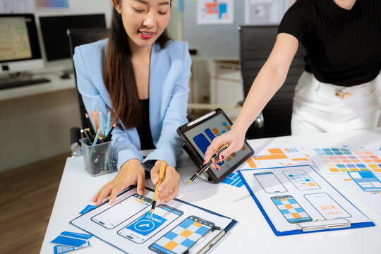 designer team coder or developer working using a computer display and smartphone in problem solving at workplace.