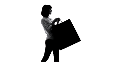 Silhouette of a woman holding a shopping bag against a white background