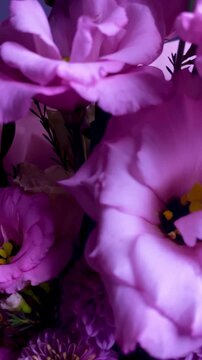 Pink eustoma and rose bouquet close-up on dark background &mdash; elegant floral composition with white buds, romantic flowers, wedding decoration, luxury blossom, beauty concept, natural elegance