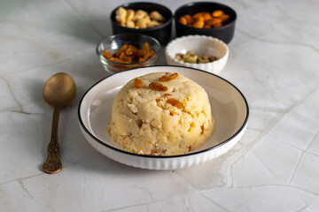 Suji ka halwa is a traditional Indian dessert made from semolina, ghee, sugar, and nuts, offering rich, sweet, aromatic flavor.
