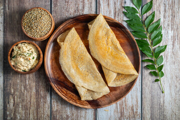 Bajra dosa is a healthy South Indian crepe made from pearl millet, crisp outside, soft inside, rich in fiber and nutrients.
